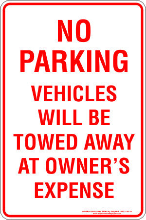 NO PARKING VEHICLES WILL BE TOWED AT OWNERS EXPENSE