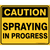 spraying in progress sign